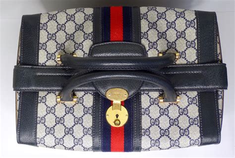 fake gucci train case